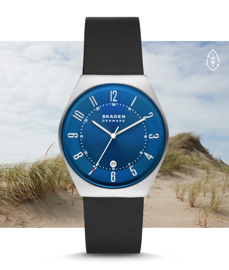 Image of a watch on a beach.