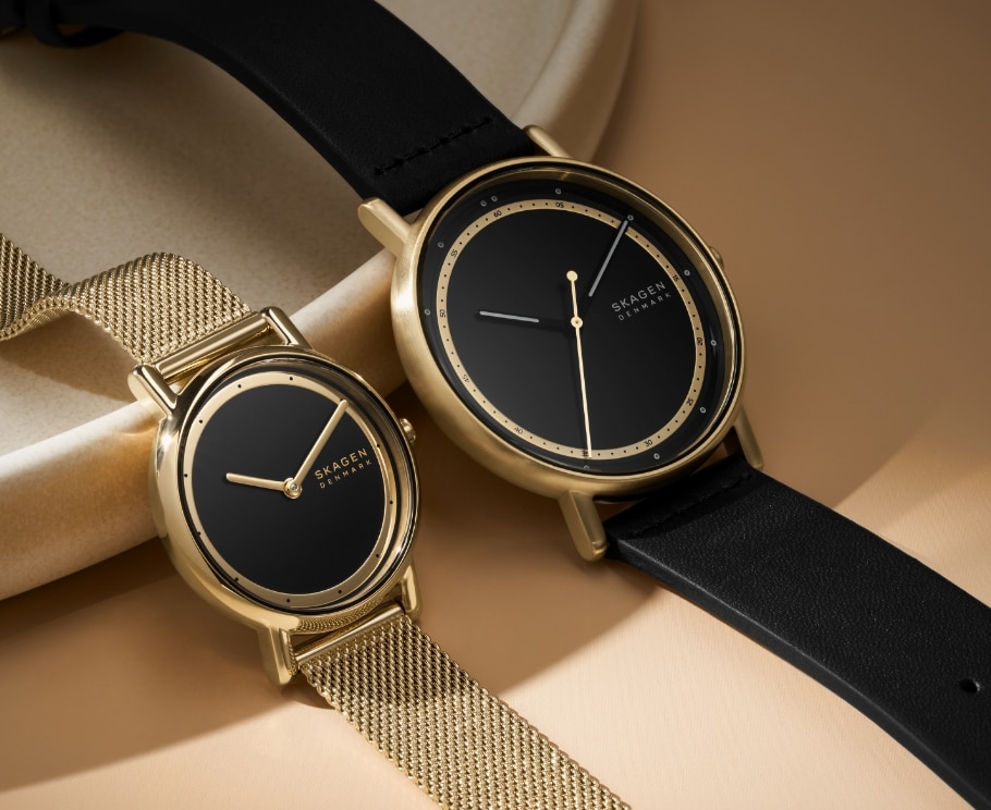 Multiple images showing black & gold Skagen watches.