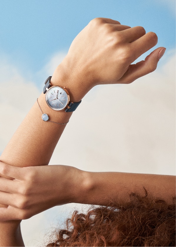a Skagen solar watch on a person’s wrist