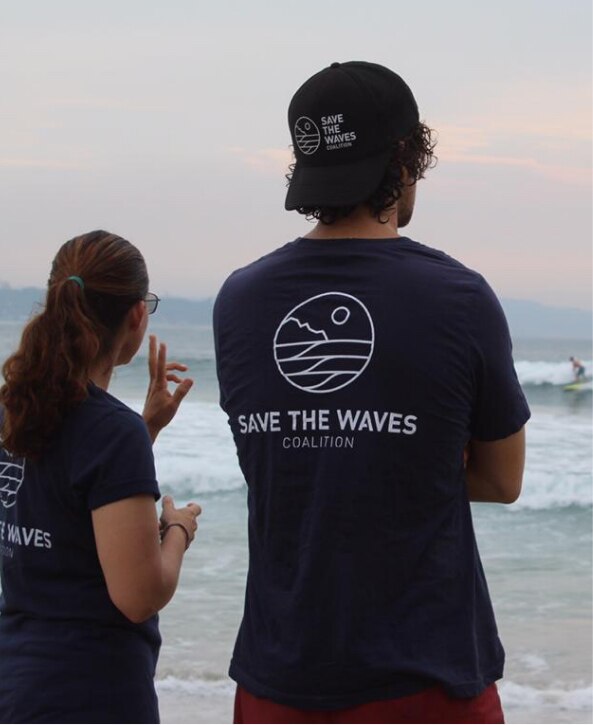 Image of beach clean-up. Image of the ocean. Image of two people on the beach.