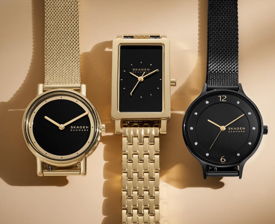 Multiple images showing black & gold Skagen watches.