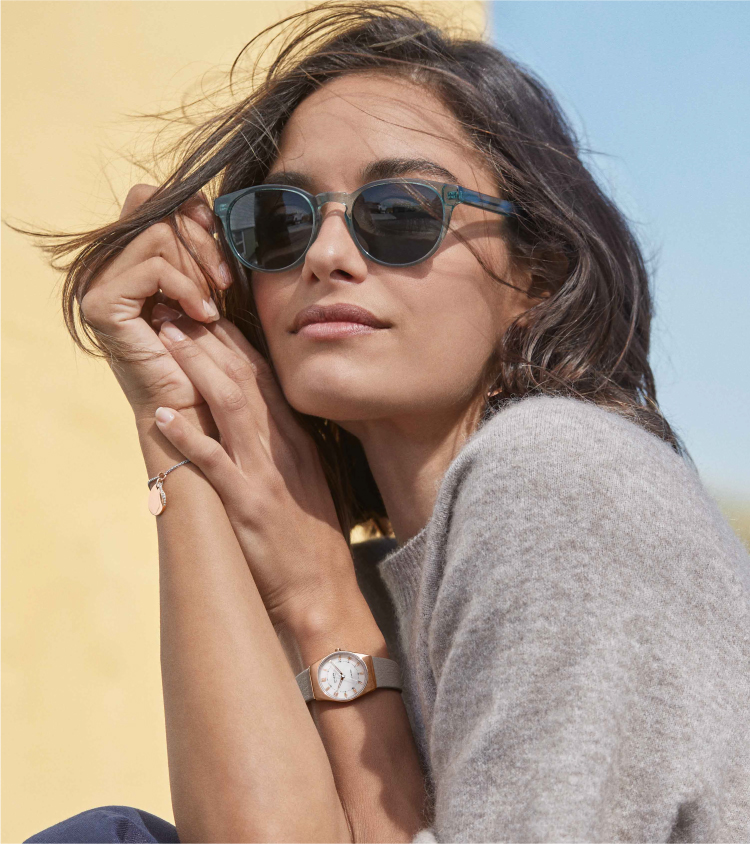 woman wearing a grenen solar watch