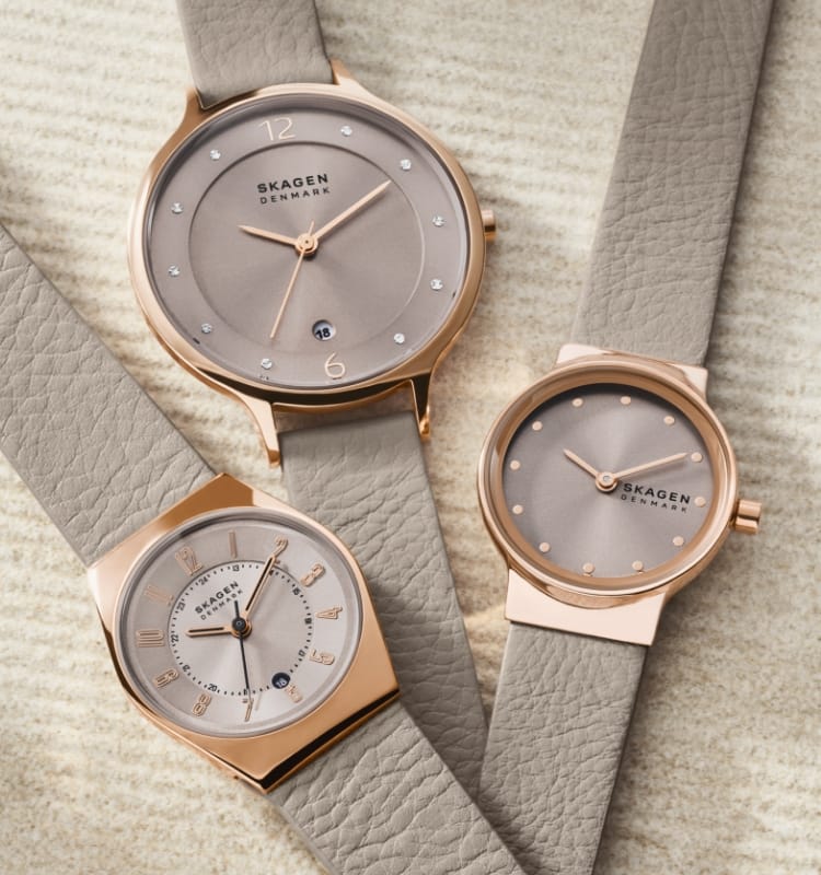Three grey leather watches