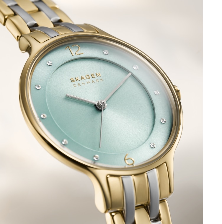 Heroic image of a new Anita Lille watch with a mint coloured dial.