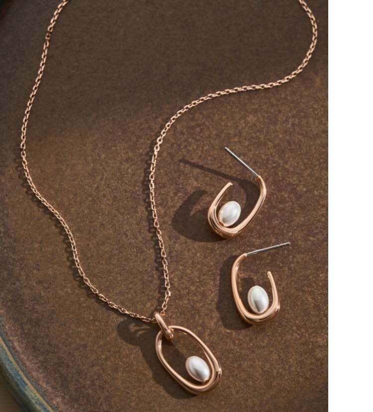 Image of earrings and necklace from the Sea Lantern jewelry collection