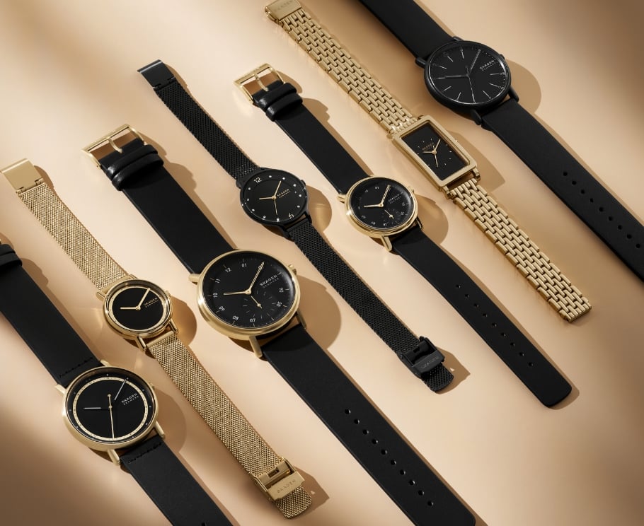 Multiple images showing black & gold Skagen watches.