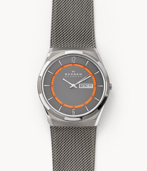 A skagen watch with 'the best time is yet to come' engraved on the back