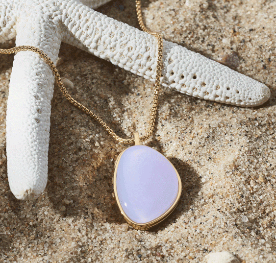Image of a locket in sand
