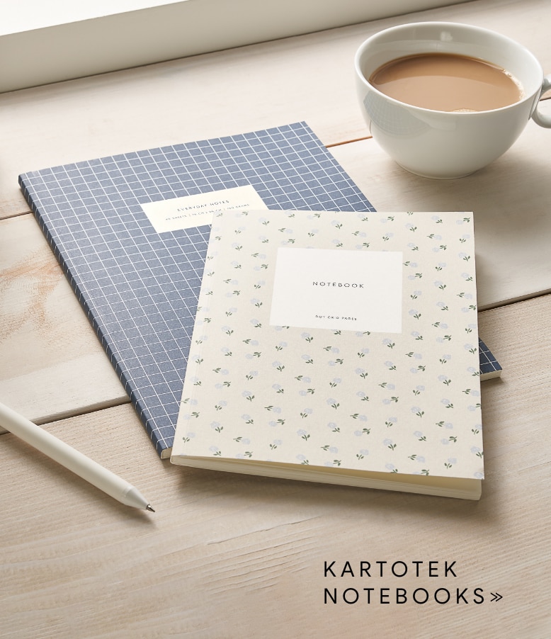 a pair of kartotek notebooks